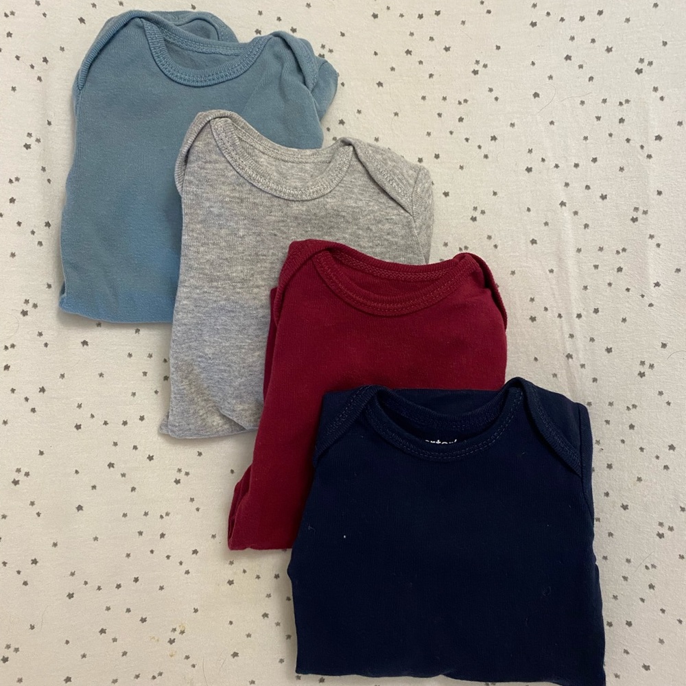 Set of 4 Carter’s long-sleeve onesie